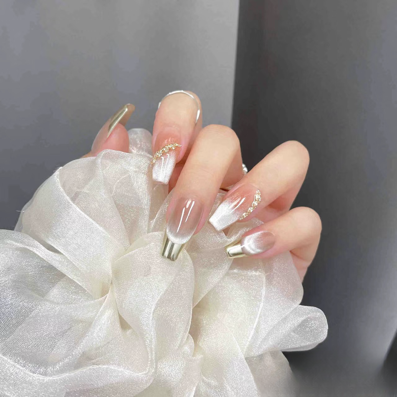 the Gentle French Nude Almond False Nails from SHOPQAQ