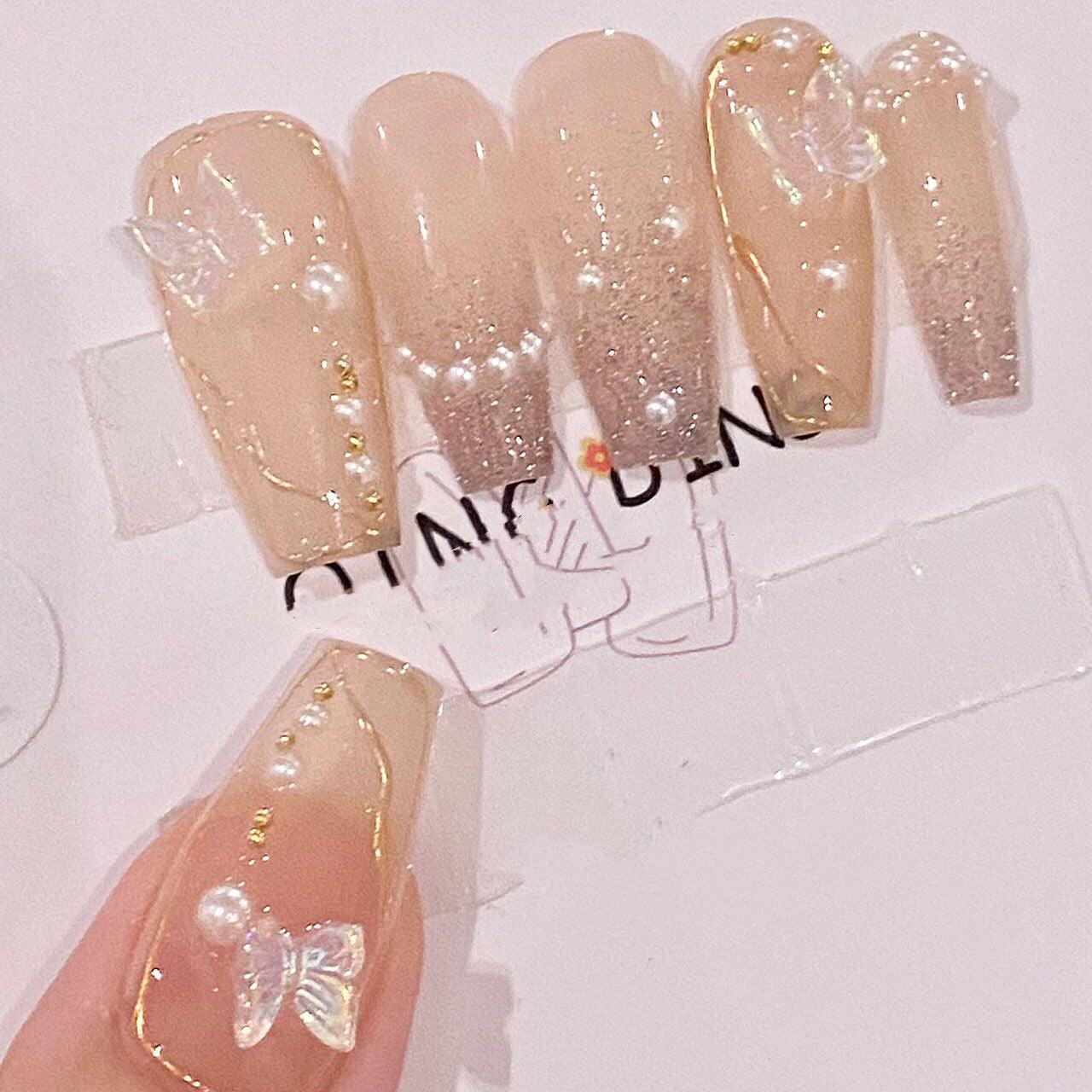 Pearl Butterfly | False Nails | Chip-resistant nails, Customizable nails, Diamond butterfly, Elegant nails, Handmade false nails, Nail art design, Removable false nails, Show white pearl, Special occasion nails, Whimsical nails. | SHOPQAQ