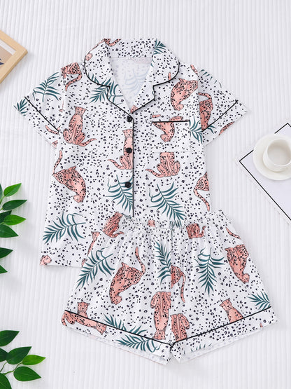 Satin-look pajama set with tiger print — short sleeve button-up top and elastic waist shorts in silky stretch fabric