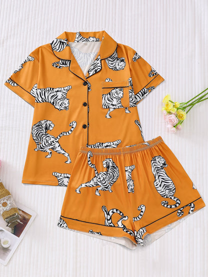 Satin-look pajama set with tiger print — short sleeve button-up top and elastic waist shorts in silky stretch fabric