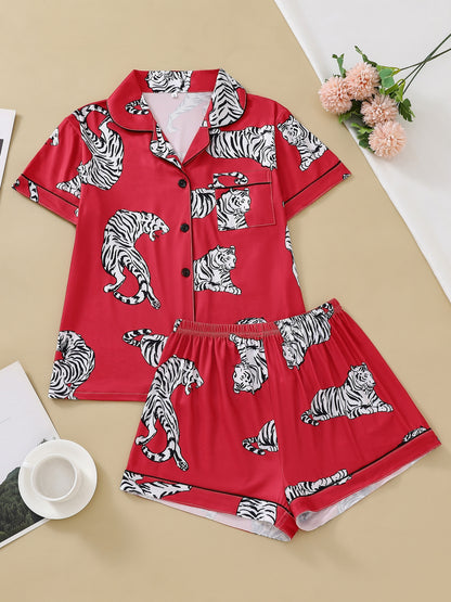 Satin-look pajama set with tiger print — short sleeve button-up top and elastic waist shorts in silky stretch fabric