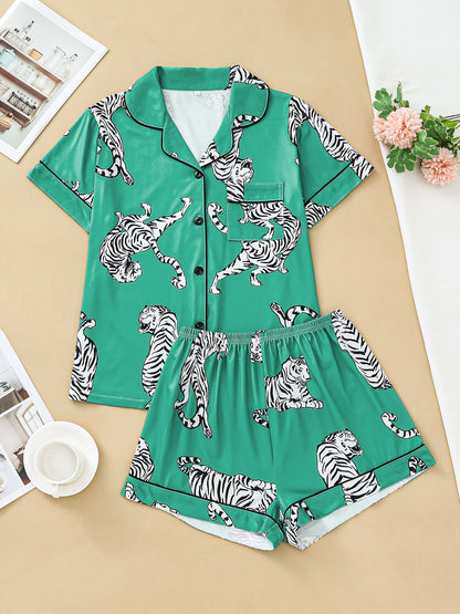Satin-look pajama set with tiger print — short sleeve button-up top and elastic waist shorts in silky stretch fabric