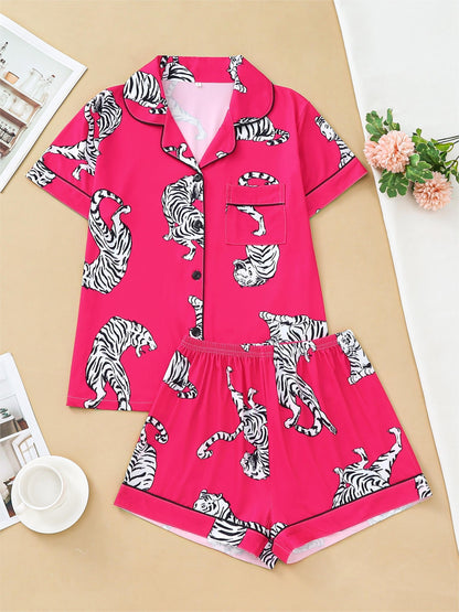 Satin-look pajama set with tiger print — short sleeve button-up top and elastic waist shorts in silky stretch fabric