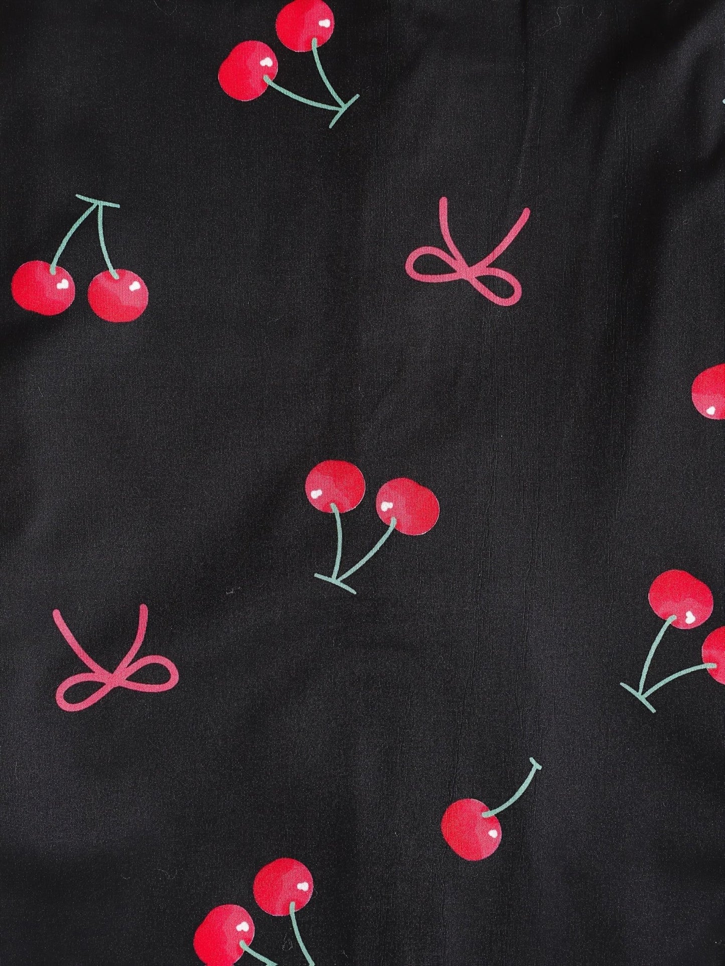 Black satin-look short-sleeve pajama set with red cherry print, piped trim, chest pocket and elastic waist shorts in 95% Polyester 5% Elastane