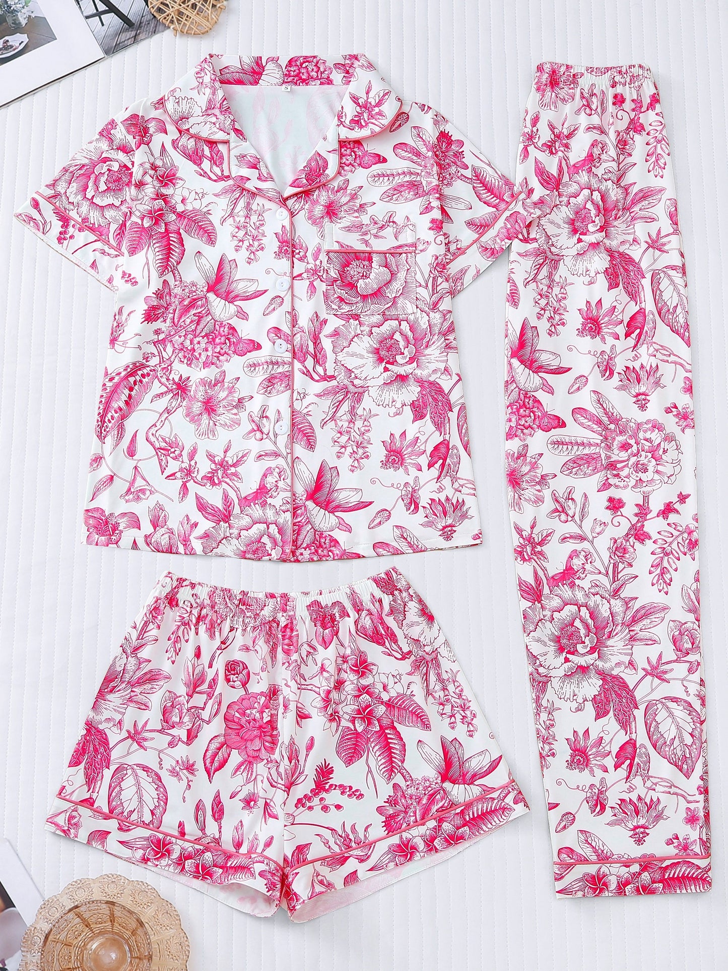 White silk‑touch modal short‑sleeve pajama top and elastic waist shorts with pink toile floral print and tonal piping