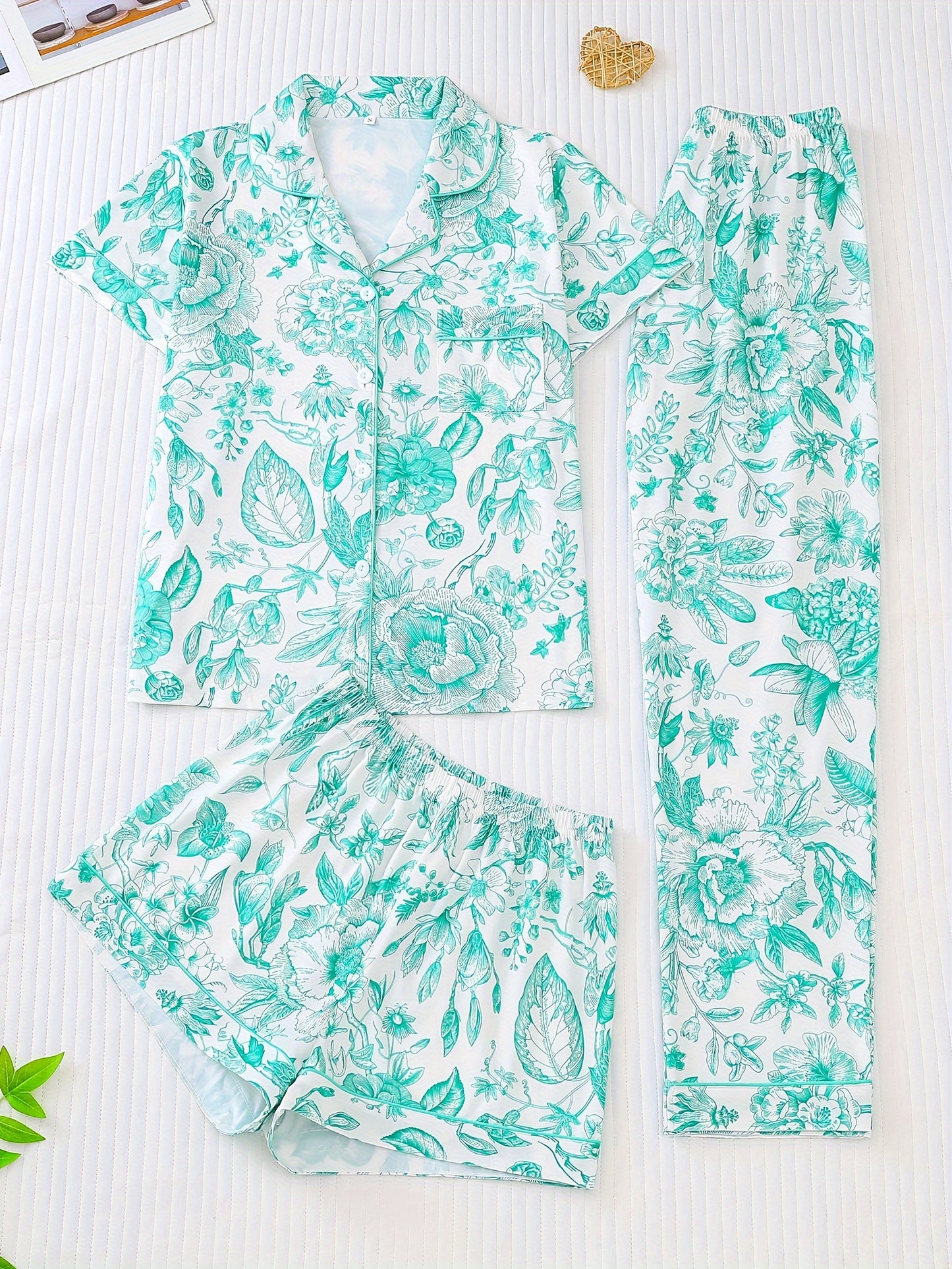 White silk‑touch modal short‑sleeve pajama top and elastic waist shorts with pink toile floral print and tonal piping