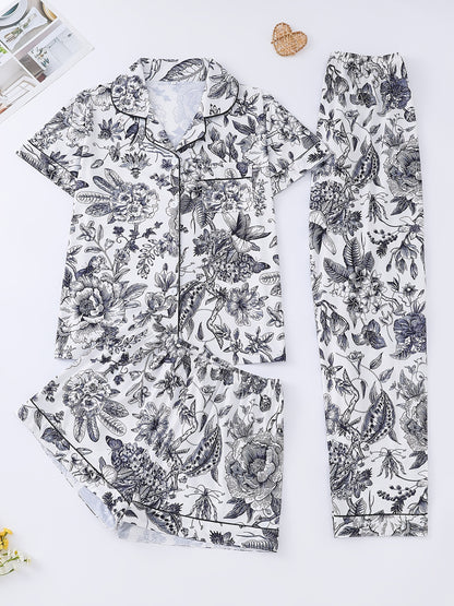 White silk‑touch modal short‑sleeve pajama top and elastic waist shorts with pink toile floral print and tonal piping