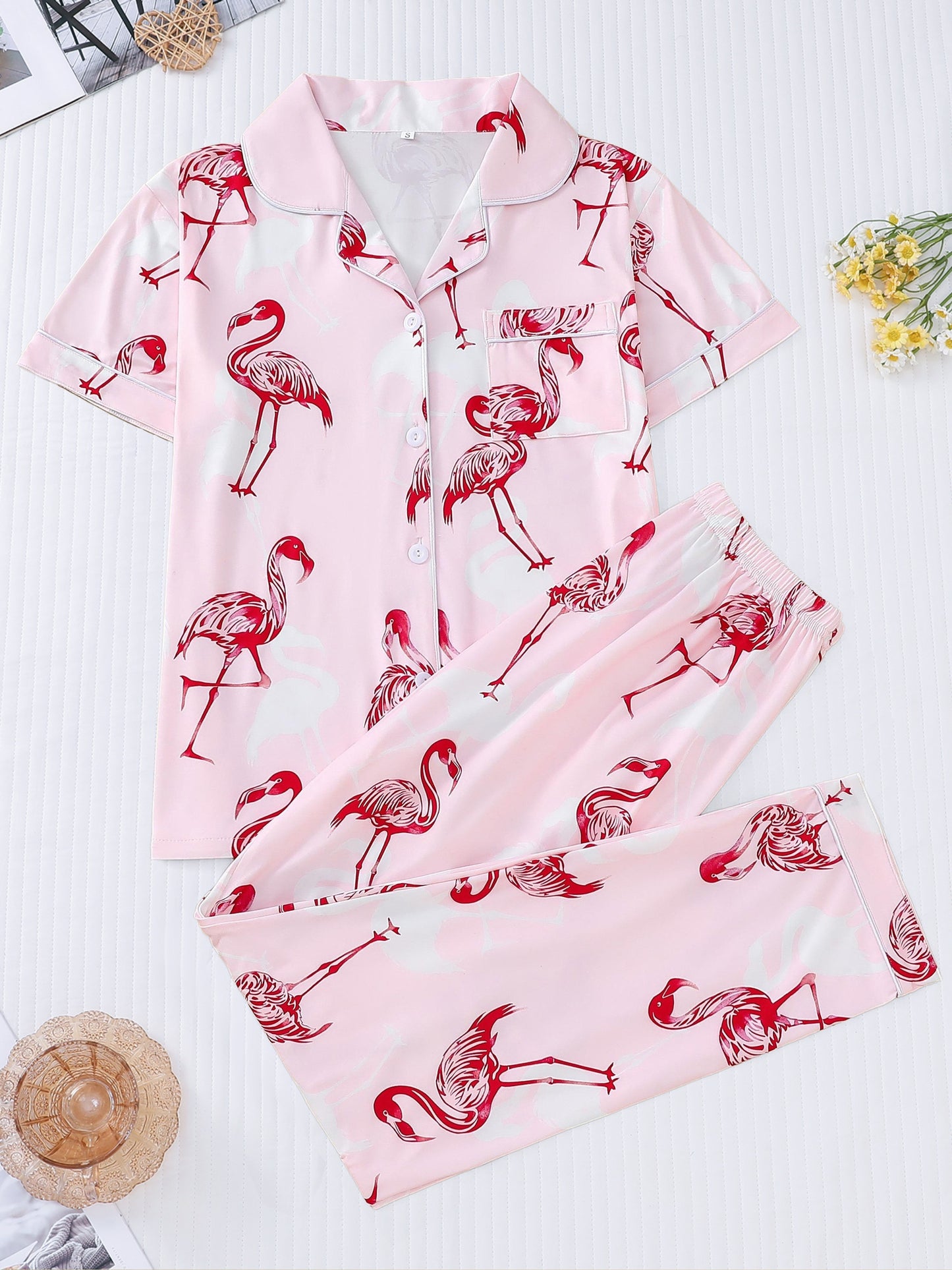 Blush satin-look pajama set with red flamingo print — short-sleeve button-up top with chest pocket and elastic waist pants, 95% Polyester/5% Elastane