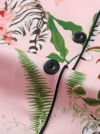 Blush satin-look pajama set with white tiger and green foliage print — long-sleeve button-up top with chest pocket and elastic waist pants, 95% Polyester/5% Elastane