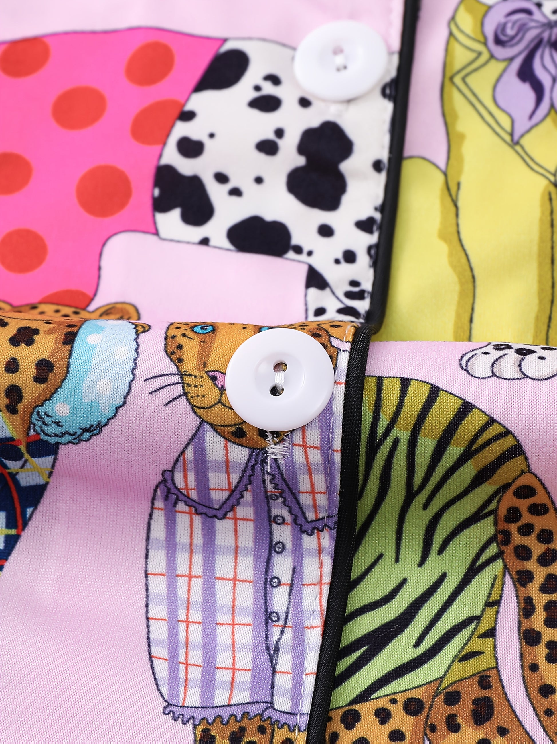 Blush pink satin-look pajama set with colorful leopard illustrations and polka dots — short-sleeve button-up top with chest pocket and elastic waist shorts, 95% Polyester/5% Elastane