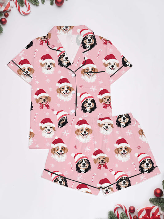 Pink holiday puppy print modal pajama set — short‑sleeve button top and elastic waist shorts with piping