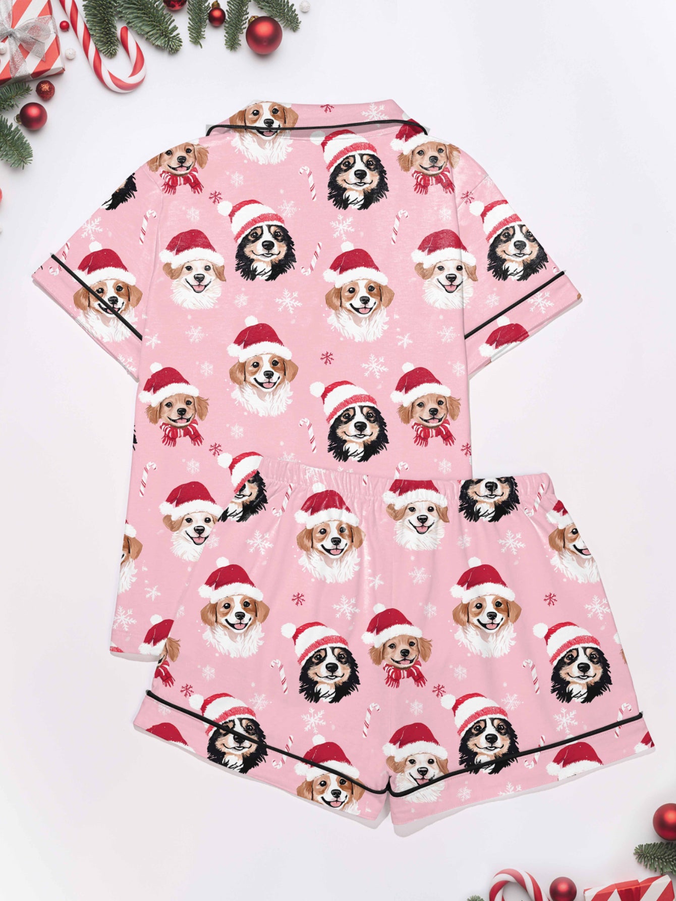 Pink holiday puppy print modal pajama set — short‑sleeve button top and elastic waist shorts with piping
