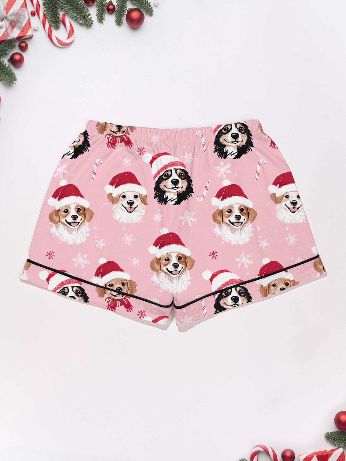 Pink holiday puppy print modal pajama set — short‑sleeve button top and elastic waist shorts with piping