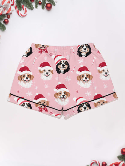 Pink holiday puppy print modal pajama set — short‑sleeve button top and elastic waist shorts with piping
