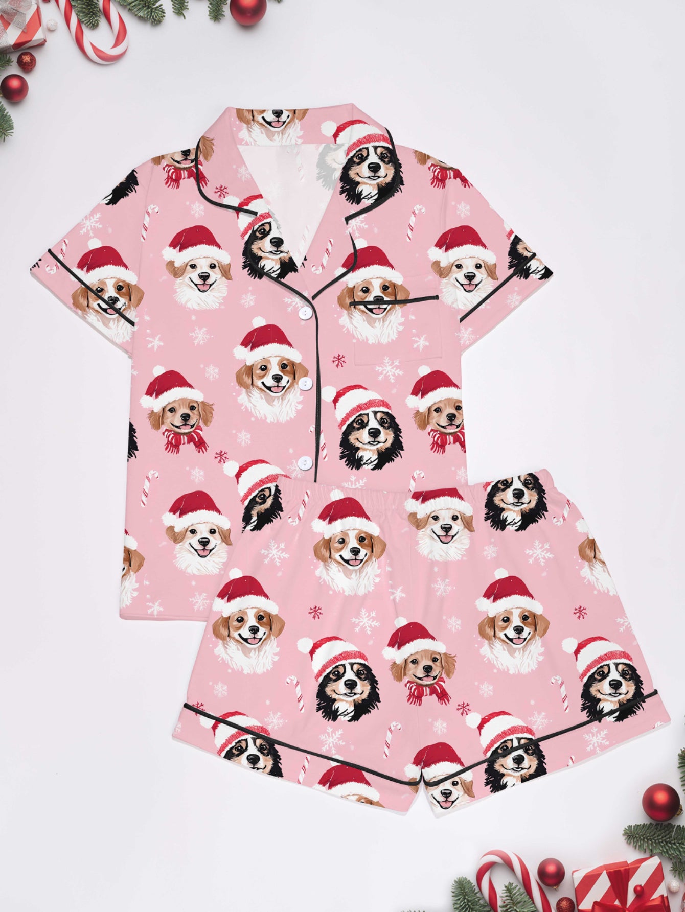 Pink holiday puppy print modal pajama set — short‑sleeve button top and elastic waist shorts with piping