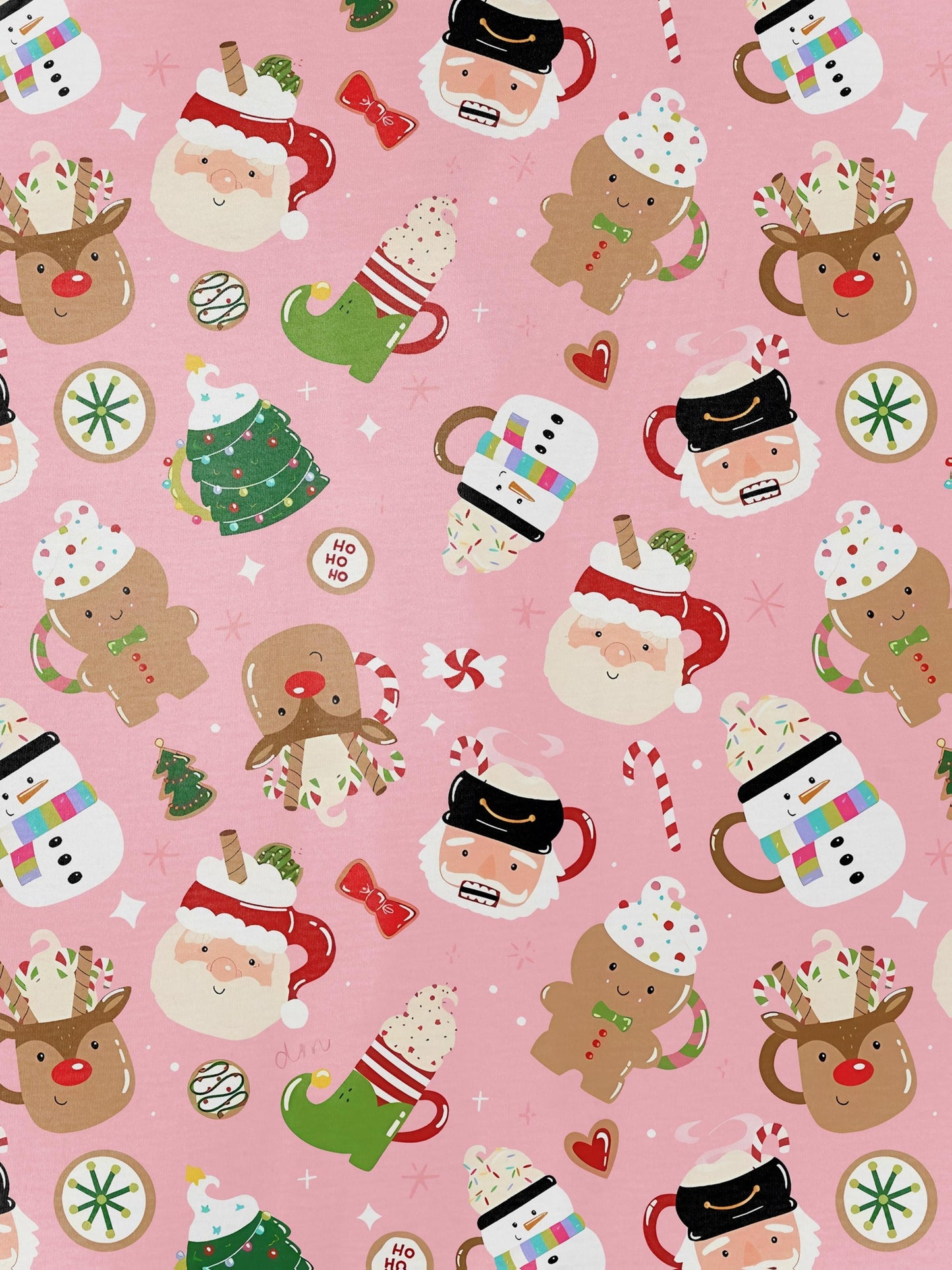 Pink satin‑look sleep shorts with playful Christmas icons — Santa mugs, snowmen, gingerbread, reindeer and candy — elastic waist and white piping