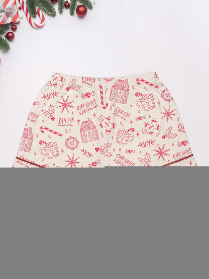 Cream short-sleeve women’s pajama set with red holiday sketch print of gingerbread houses, candy canes and cocoa mugs — short top and elastic waist shorts in 95% polyester 5% elastane