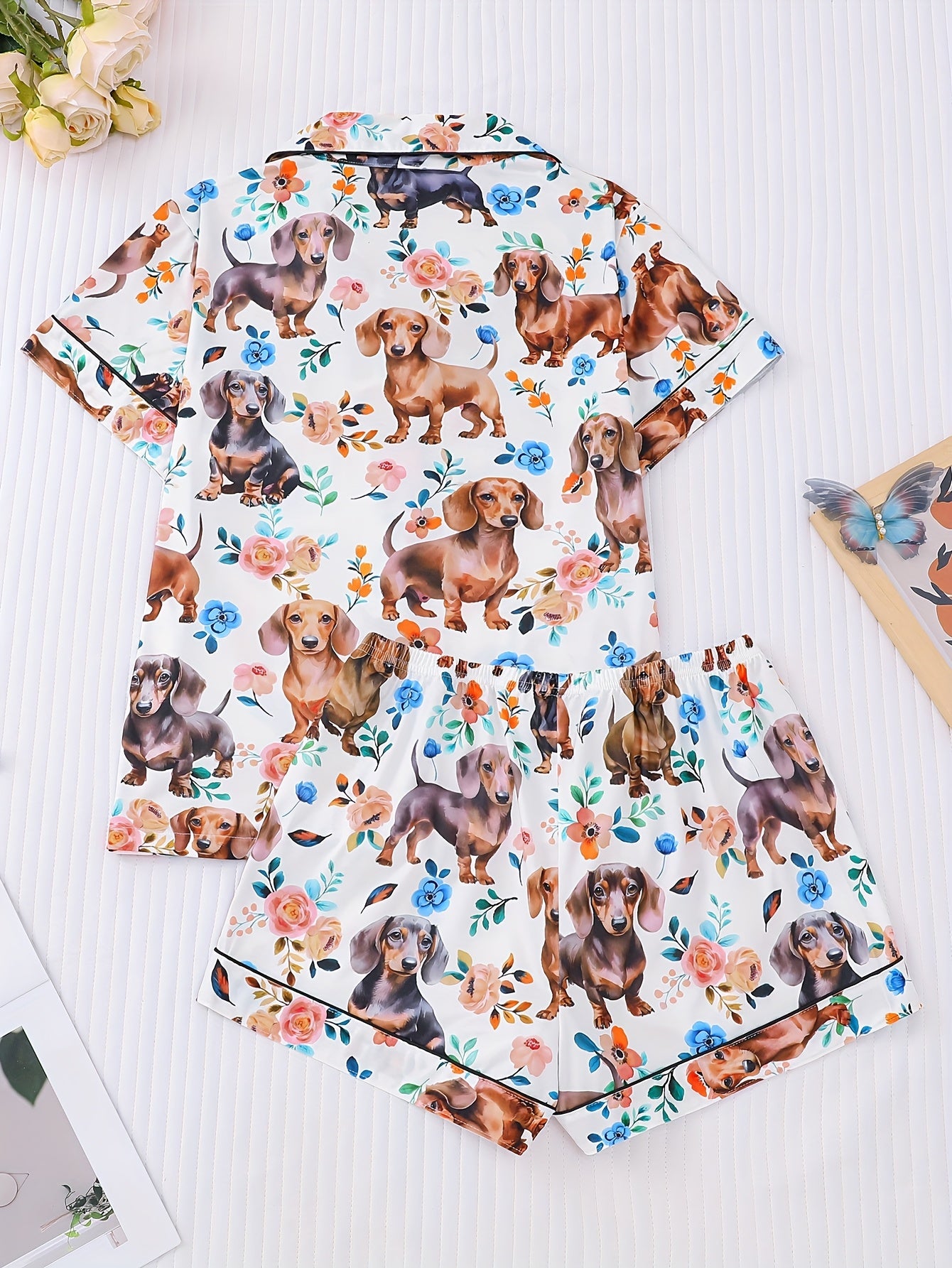 White satin-look pajama set with dachshund and floral print, piped trim, short sleeve button top and elastic waist shorts in silky stretch fabric — 95% Polyester/5% Elastane