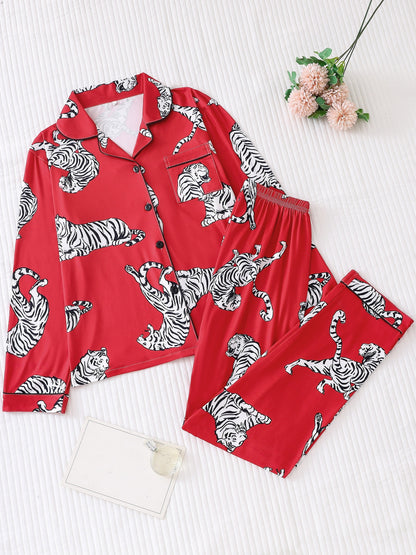 Fuchsia satin-look pajama set with white-and-black tiger print — long-sleeve button-up top with chest pocket and elastic waist pants, 95% Polyester/5% Elastane