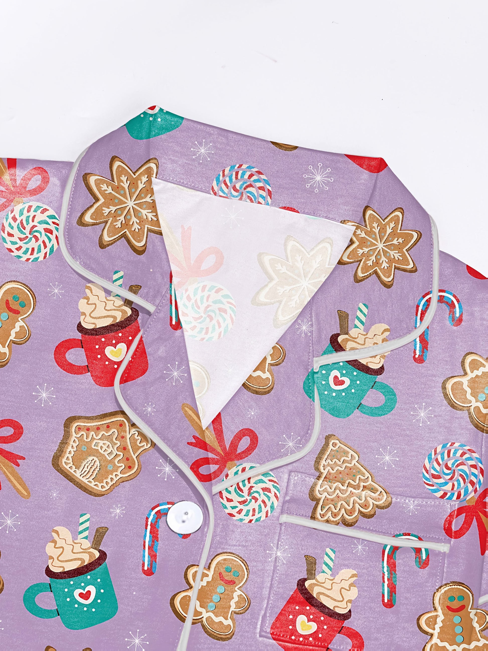 Black‑lavender modal pajama set with gingerbread, candy cane and cocoa mug print — short‑sleeve button top and elastic waist shorts with pale piping