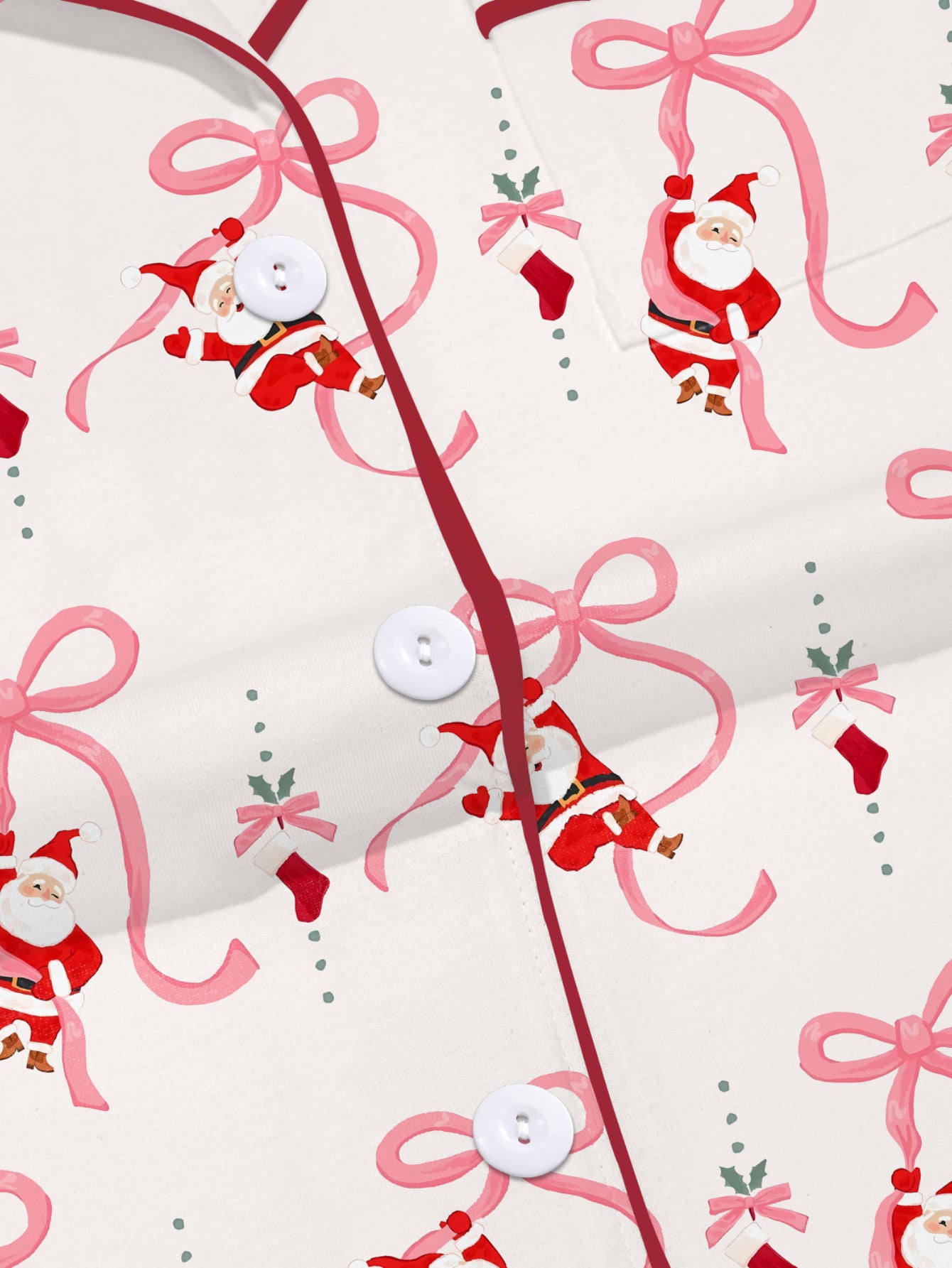 Cream modal pajama set with Santa and pink ribbon print — short‑sleeve button top and elastic waist shorts with pink piping
