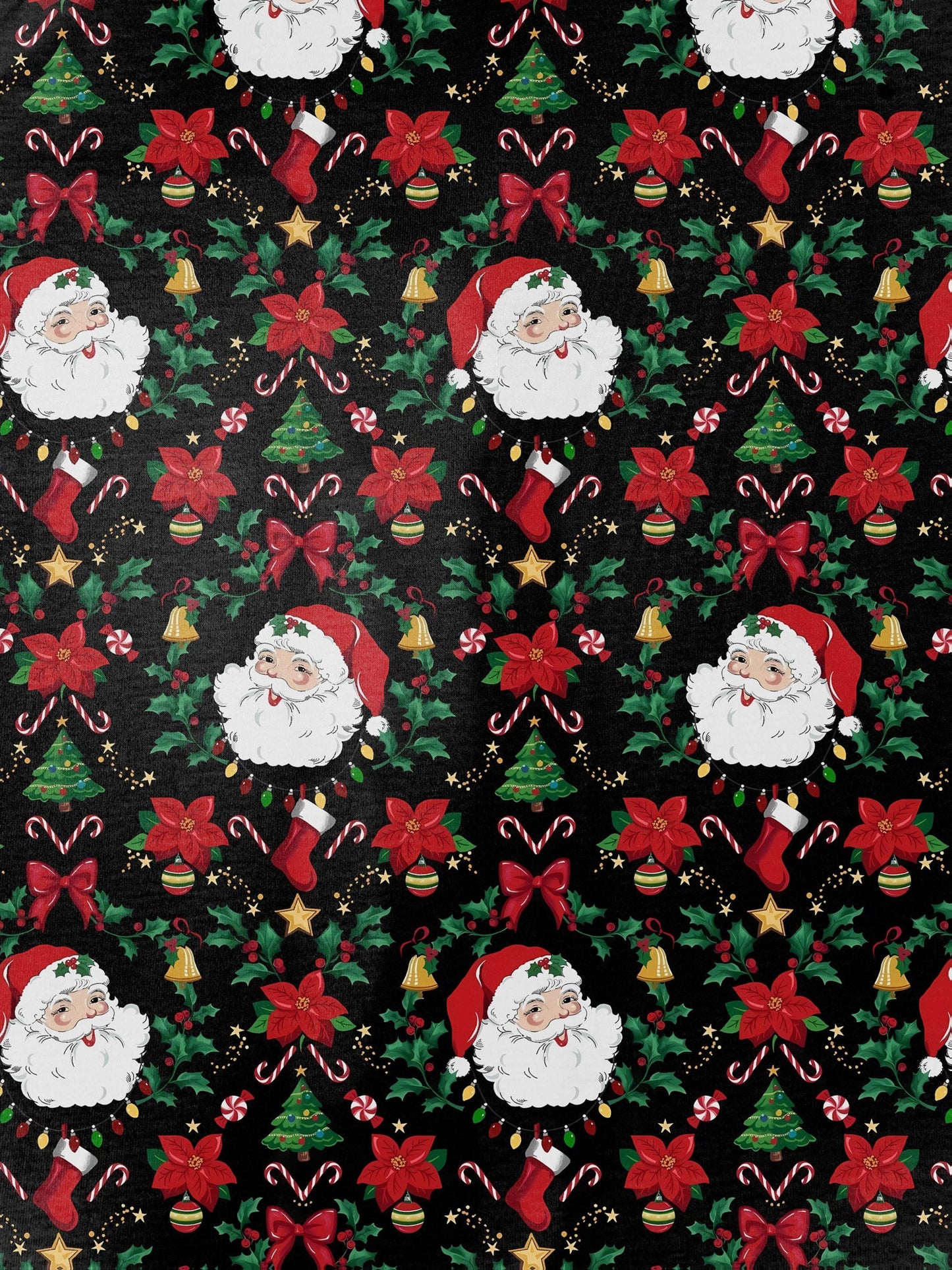 Woman wearing black short-sleeve pajama set with Santa, poinsettia and candy cane print — button-up top and elastic waist shorts with red piping