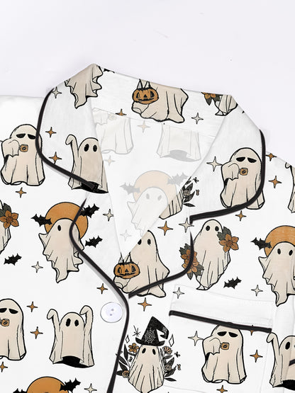 Ivory modal pajama set with ghost and pumpkin print — short sleeve button top and elastic waist shorts with black piping