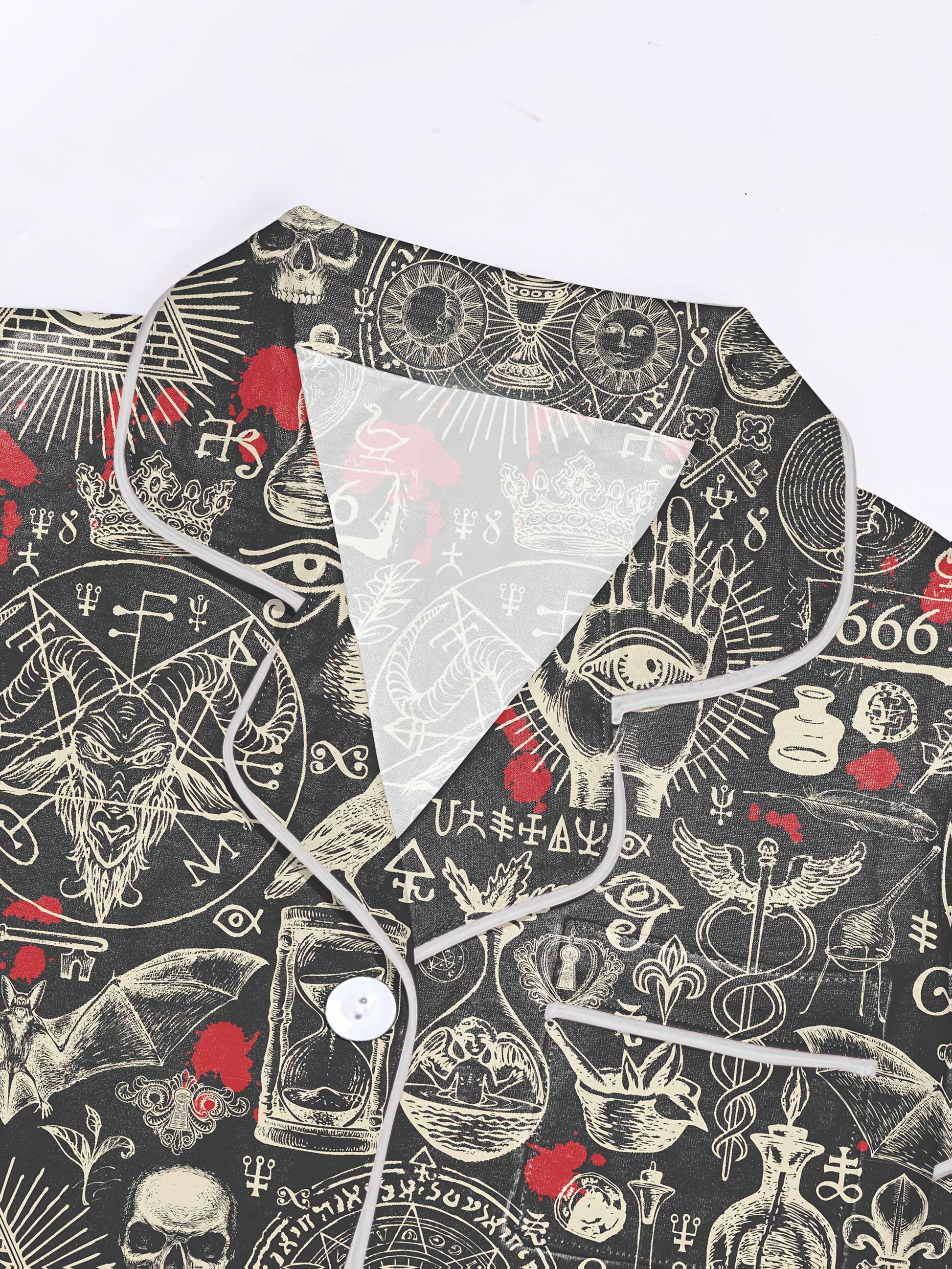 Dark occult print modal pajama set with skulls, sigils and mystic hands — short sleeve button top and elastic waist shorts with piping