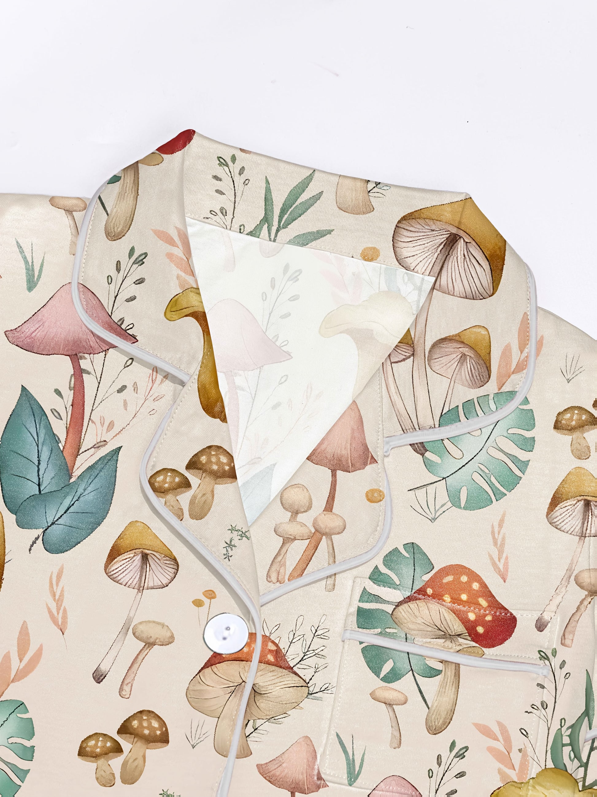 Cream mushroom watercolor print modal pajama set — short‑sleeve button top and elastic waist shorts with piping