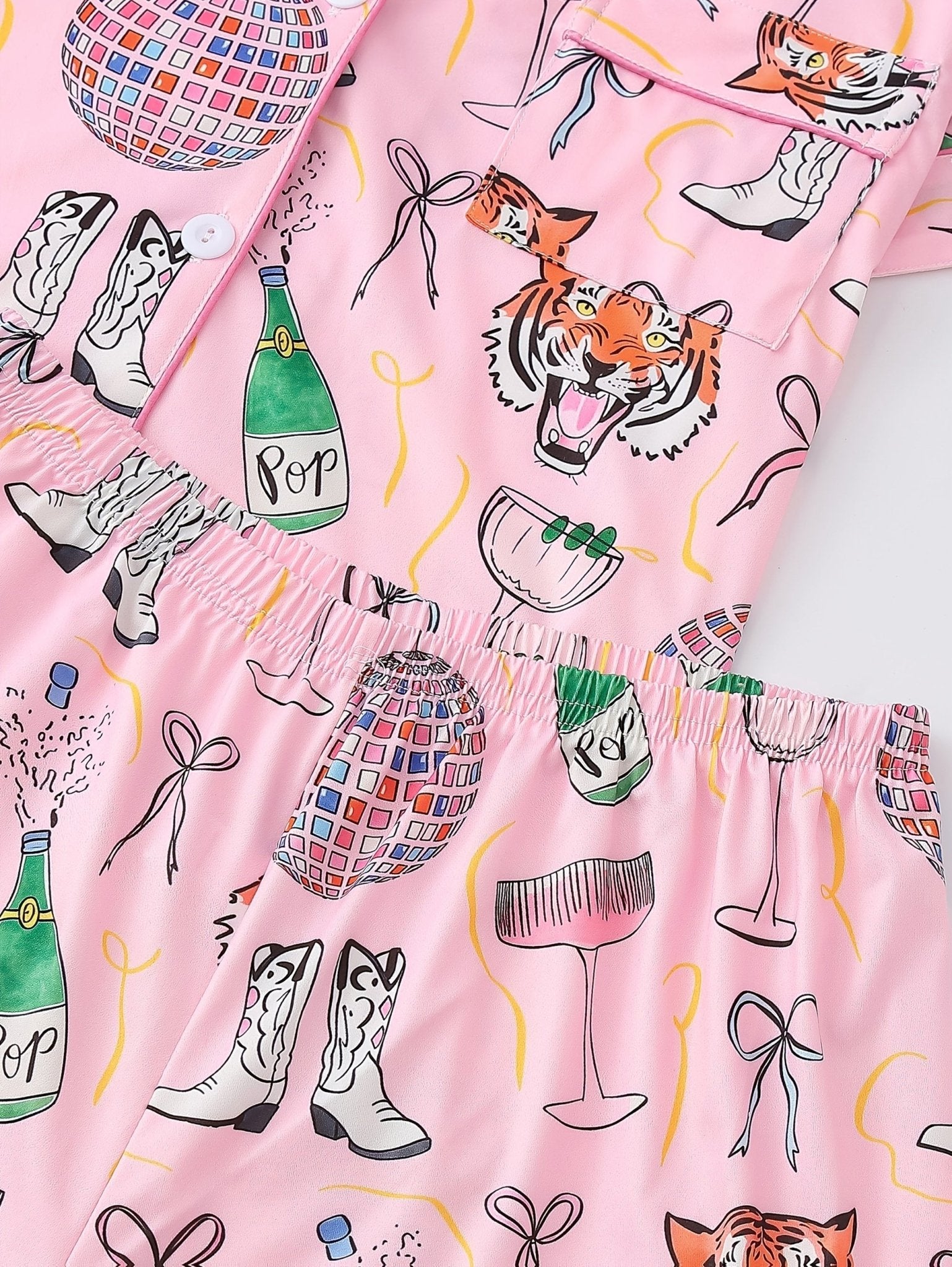 Pink satin-look short-sleeve pajama set with party tiger print, piped trim, chest pocket and elastic waist shorts in 95% Polyester 5% Elastane