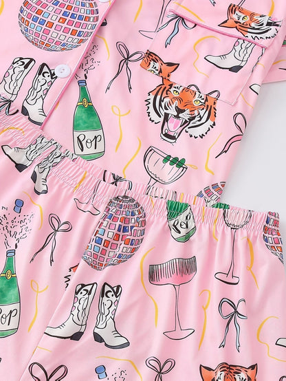 Pink satin-look short-sleeve pajama set with party tiger print, piped trim, chest pocket and elastic waist shorts in 95% Polyester 5% Elastane