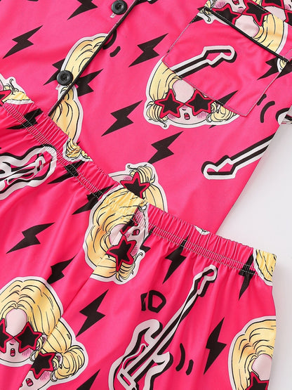 Bright pop-pink satin-look short-sleeve pajama set with guitar and star-sunglasses print, piped trim, chest pocket and elastic waist shorts in 95% Polyester 5% Elastane — silky stretch travel-ready loungewear