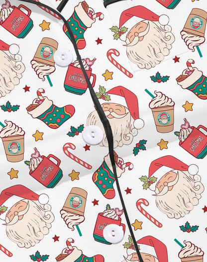 Cream modal pajama set with Santa faces and cocoa mugs print — short‑sleeve button top and elastic waist shorts with piping