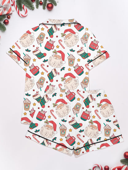 Cream modal pajama set with Santa faces and cocoa mugs print — short‑sleeve button top and elastic waist shorts with piping