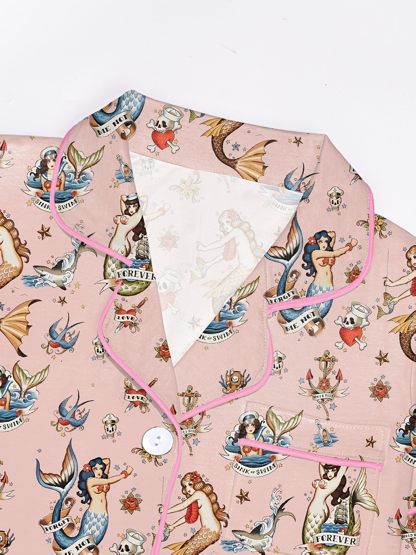 Blush modal short‑sleeve pajama set with vintage mermaid tattoo print — button top with notch collar and elastic waist shorts with pink piping