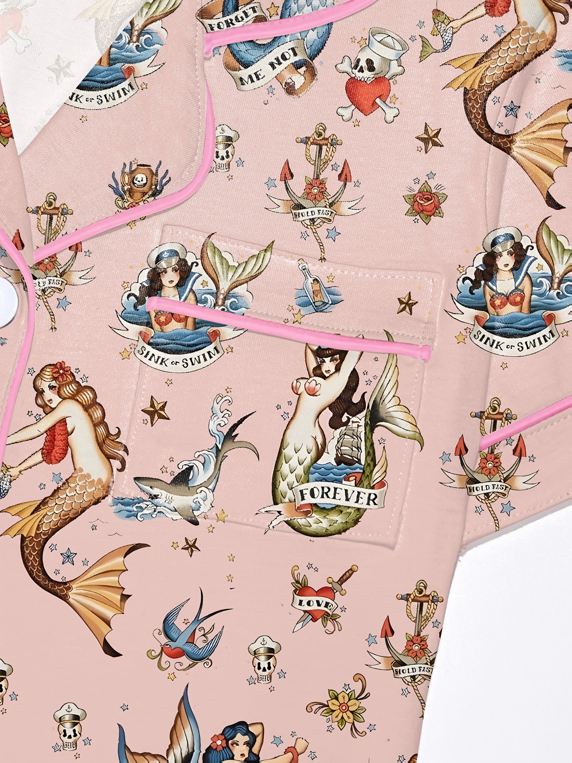 Blush modal short‑sleeve pajama set with vintage mermaid tattoo print — button top with notch collar and elastic waist shorts with pink piping