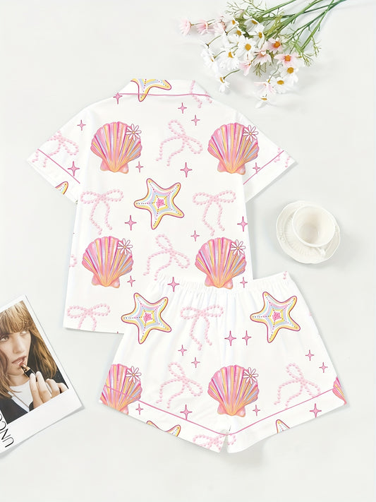 White short-sleeve women’s pajama set with pink seashell and starfish print — button-up top and elastic waist shorts in 95% polyester 5% elastane
