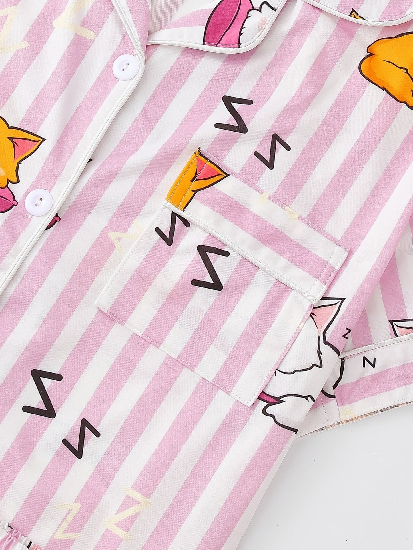 Pink stripe satin-look short-sleeve pajama set with orange and white sleeping cat print, piped trim, chest pocket and elastic waist shorts in 95% Polyester 5% Elastane — silky stretch travel-ready loungewear
