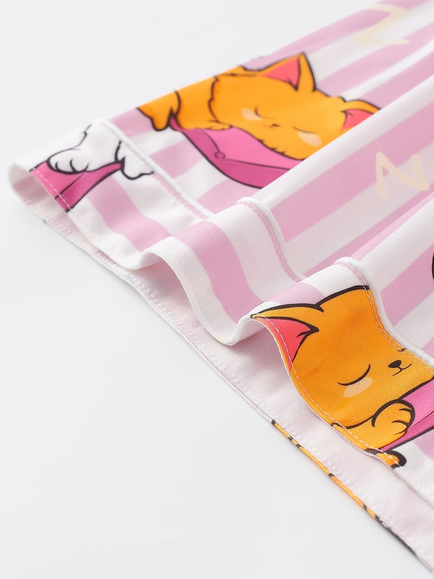 Pink stripe satin-look short-sleeve pajama set with orange and white sleeping cat print, piped trim, chest pocket and elastic waist shorts in 95% Polyester 5% Elastane — silky stretch travel-ready loungewear