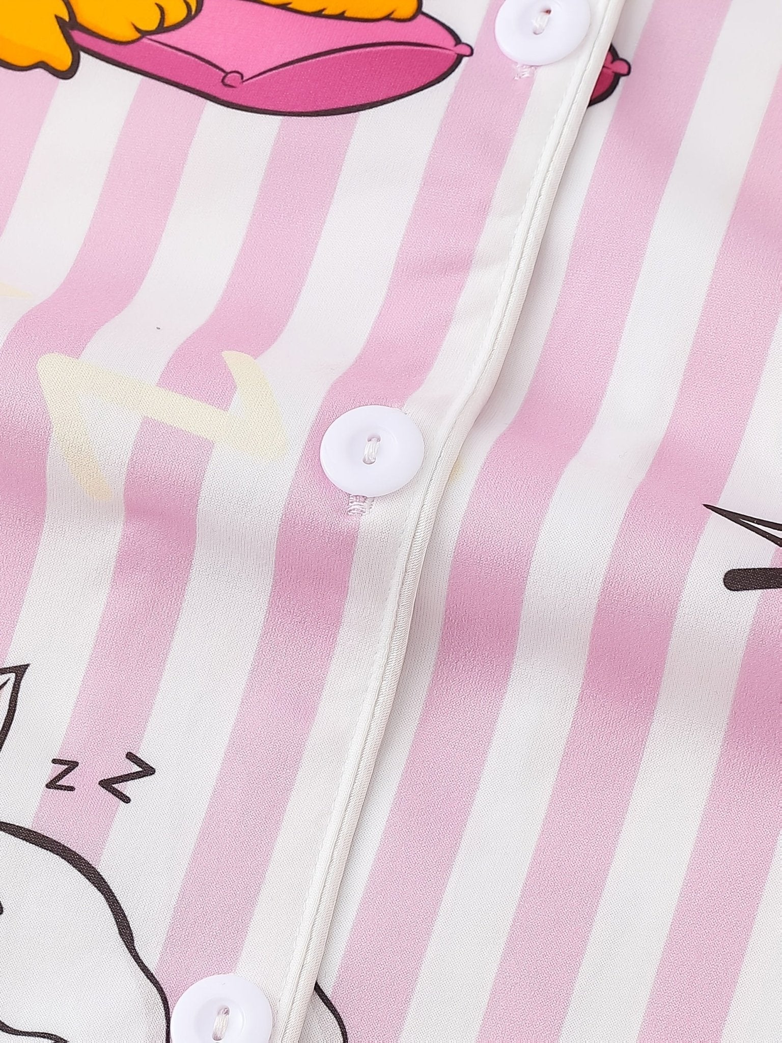 Pink stripe satin-look short-sleeve pajama set with orange and white sleeping cat print, piped trim, chest pocket and elastic waist shorts in 95% Polyester 5% Elastane — silky stretch travel-ready loungewear