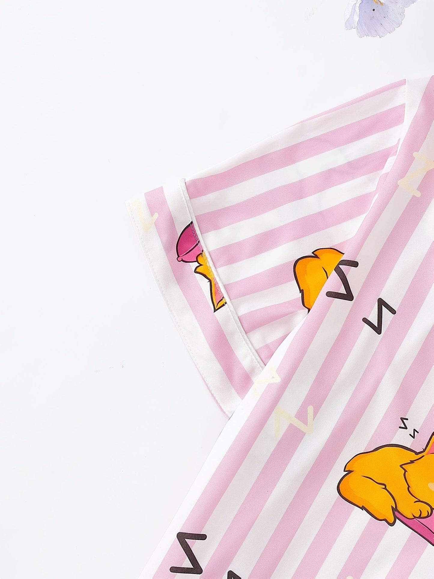 Pink stripe satin-look short-sleeve pajama set with orange and white sleeping cat print, piped trim, chest pocket and elastic waist shorts in 95% Polyester 5% Elastane — silky stretch travel-ready loungewear