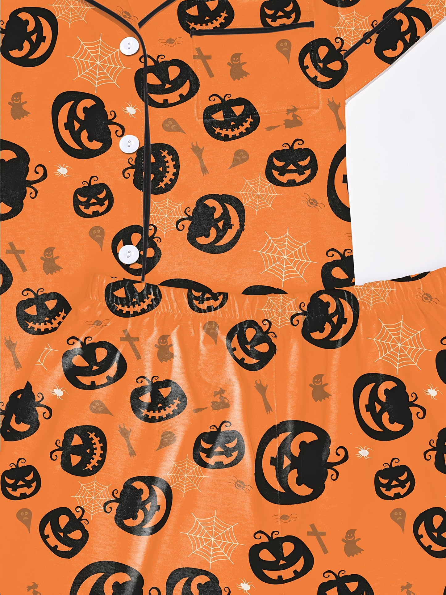 Warm pumpkin modal short‑sleeve pajama set with jack‑o‑lantern and spiderweb print — button top and elastic waist shorts with black piping