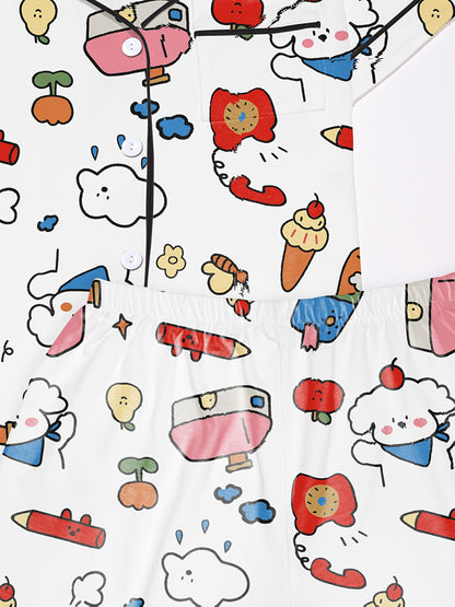 Ivory modal short‑sleeve pajama set with colorful doodle print — button top with notch collar and elastic waist shorts with black piping