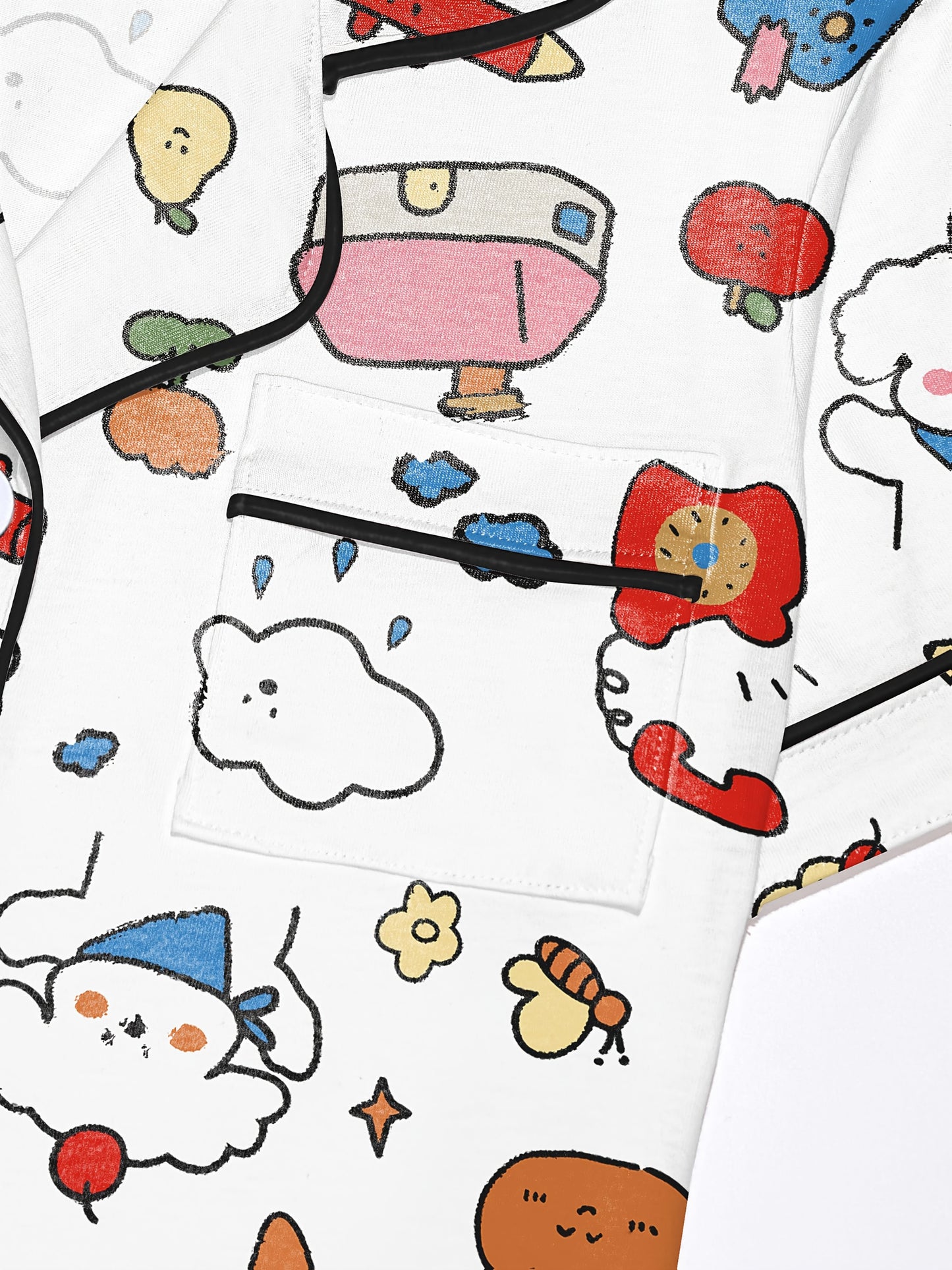 Ivory modal short‑sleeve pajama set with colorful doodle print — button top with notch collar and elastic waist shorts with black piping