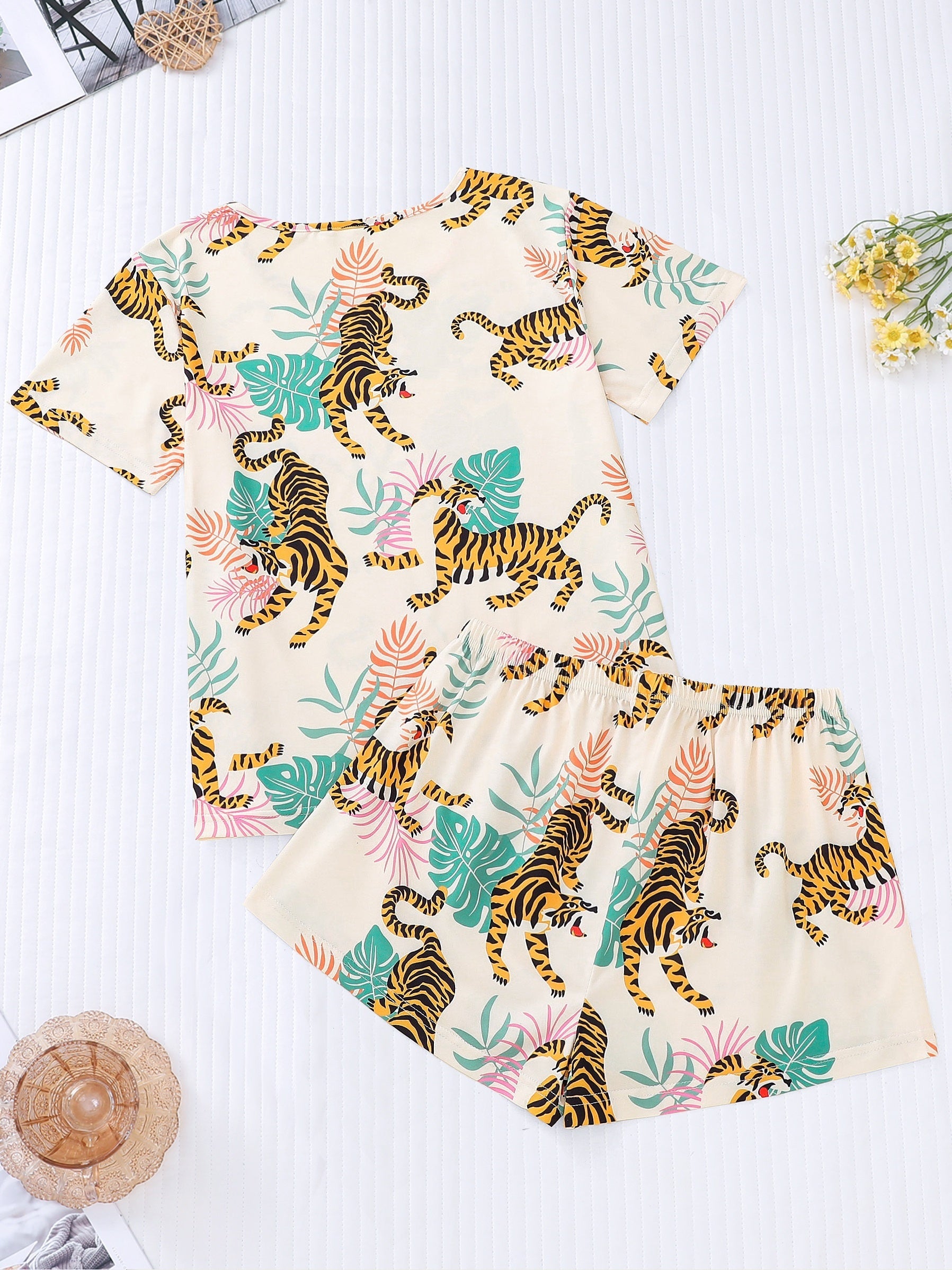 Cream satin-look short pajama set with watercolor tiger and palm-leaf print — short-sleeve relaxed top and elastic waist shorts, 95% Polyester/5% Elastane, lightweight and breathable