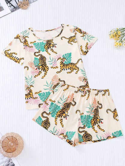 Cream satin-look short pajama set with watercolor tiger and palm-leaf print — short-sleeve relaxed top and elastic waist shorts, 95% Polyester/5% Elastane, lightweight and breathable
