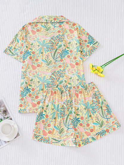 Tropical bird print satin-look short sleeve pajama set with piped trim, chest pocket and elastic waist shorts in silky stretch fabric — 95% Polyester 5% Elastane
