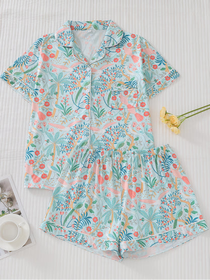 Tropical bird print satin-look short sleeve pajama set with piped trim, chest pocket and elastic waist shorts in silky stretch fabric — 95% Polyester 5% Elastane