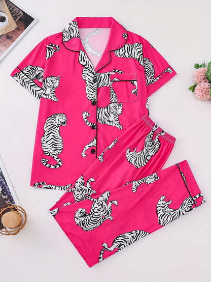 Silk‑touch modal short‑sleeve pajama top and elastic waist shorts with contrast piping and playful print