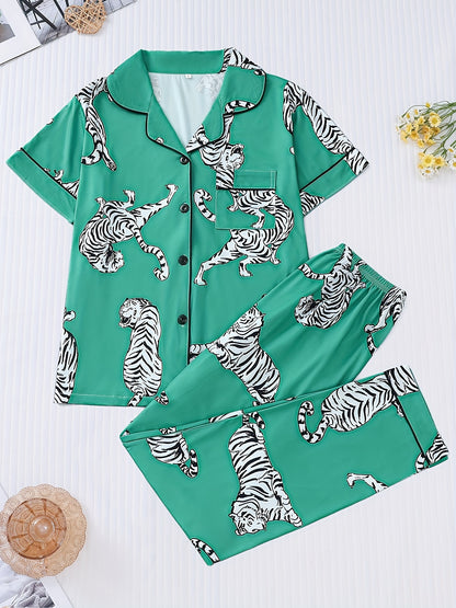 Silk‑touch modal short‑sleeve pajama top and elastic waist shorts with contrast piping and playful print